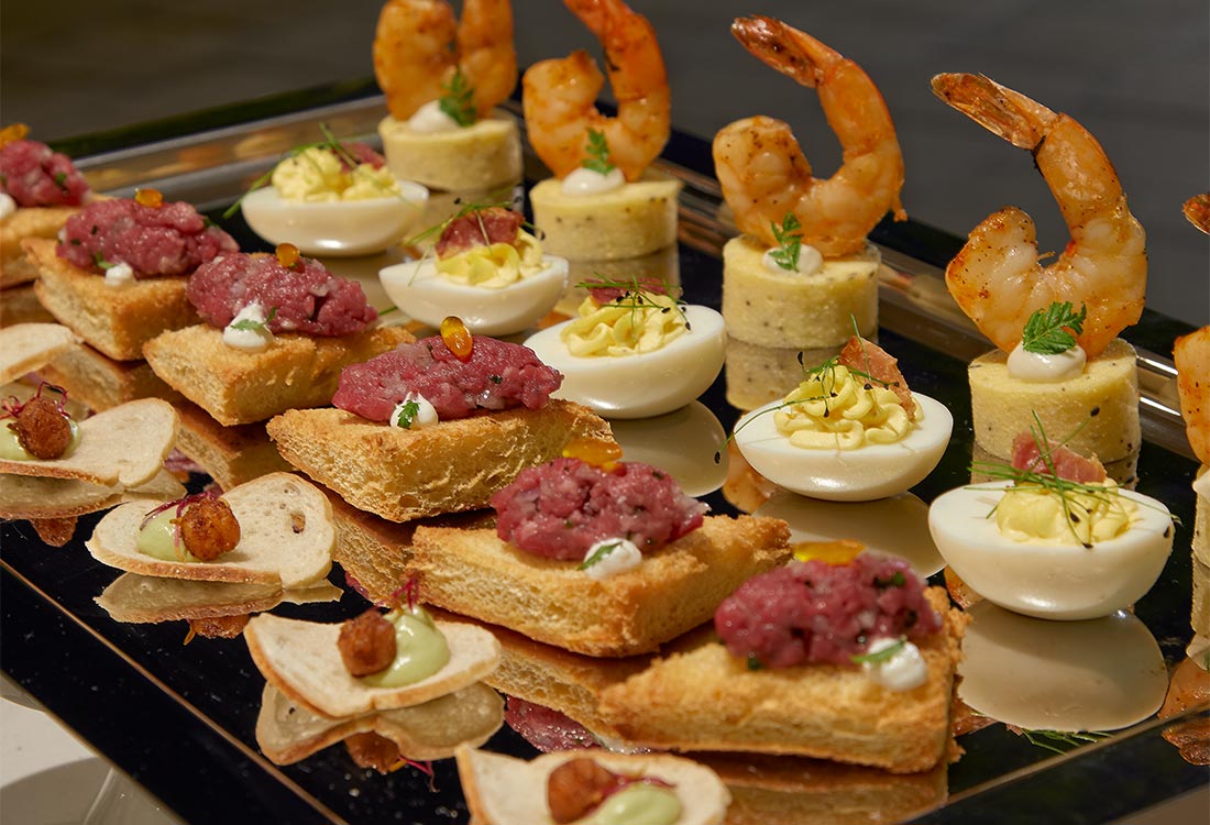 Wedding catering including shrimp, deviled eggs, tuna dishes at Seminole Hard Rock Hollywood